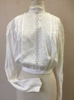 N/L, White, Cotton, Solid, Floral, High Neck with Lace Insert and Ruffle Trim Band Collar, Long Sleeves with Knife Pleats Bands in Groups of 3's. Dotted Swiss Front Bodice with Vertical Knife Pleats Borderring Openwork and Embroiderred Leaf Design Center Front. Back Bodice is Plain Cotton with Rows of Vertical Knife Pleats, Button Back. Gathered Into Fixed Waistband, Good Condition But Fragile at Neck Line,