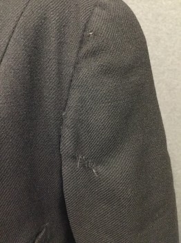 MTO, Black, Wool, Solid, Gaberdine Jacket, 3 Button Closure, Notched Lapel, 2 Button Detail at Shaped Cuff, 1 Tiny Welt Pocket with Some Wear, See Close Up Photo for Detail. Button Tab at Center Back Waist, 3 Button Detail at Faux Right Vent. Hole Repaired on Left Sleeve Front See Photo, Small Hole Near 3 Buttons at Back Faux Vent,
