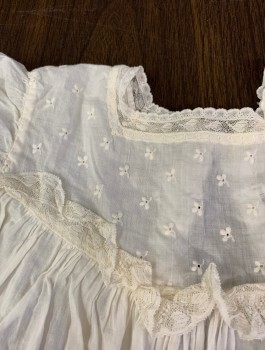 Childrens, Dress 1890s-1910s, N/L, White, Cotton, Solid, C:18", Long Sleeves, Square Neck with Lace Trim, Tiny Embroidered Flowers at Chest, Lace Ruffle Yoke Across Chest, Ruffle with Lace Trim at Hem, Opening in Back Missing Closures,