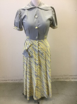 MADEMOISELLE, Gray, Yellow, White, Cotton, Seersucker, Stripes - Diagonal , Solid Gray Seersucker Top Half, Bottom is White with Yellow and Gray Abstract Diagonal Lines, Short Sleeves, Shirtwaist, Cuffed Sleeves with Patterned Cuff, Self Patterned Fabric Buttons at Front, Hidden Zip Closure Below Center Front Waist, Self Belt Ties at Waist, Rounded Collar Attached, Hem Ankle Length,