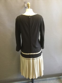N/L, Dk Brown, Khaki Brown, Wool, Polyester, Solid, Wool Blend Knit, Crew Neck. Dropped Waist 20's Style. Dark Brown Upper with Khaki Pleated Skirt. Gold Buttons at Dropped Waist Front. 3/4sleeves Zipper Center Back,