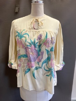 Womens, Top, APPLE CORPS, B:42, Butter Yellow with Lav/pink/green Large Faded Floral, Pull On, Key Hole Front with Tie At Neck, L/S with Turned Up Floral Cuffs, Front And Back Yoke