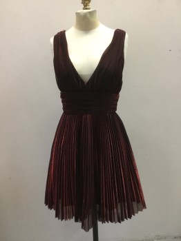 ABS, Black, Iridescent Red, Polyester, Solid, Iridescent. Shot Black & Red Poly Knit. Deep V.neck Front and Back, Sleeveless. Knife Pleated Skirt, Sash at Waist, Zipper Center Back,
