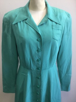 N/L MTO, Jade Green, Silk, Solid, Broadcloth, Long Sleeves, Shirtwaist, Pointy Collar Attached with Stain on Right Side (See Detail Photo), Tiny Patch Pocket at Bust, Padded Shoulders, Button Front, Pleats at Center Front Waist/Bust, Flared/Full Skirt, Knee Length, 2 Pockets at Hips in the Seam, Made To Order, Bodice Flat-lined in Muslin. Has Stress Marks at Front of Sleeve, See Detail Photo, Multiples,