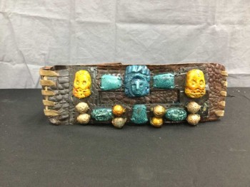 Unisex, Sci-Fi/Fantasy Belt, M.T.O., Dk Brown, Turquoise Blue, Turmeric Yellow, Gold, Leather, Fiberglass, Mayan Influenced Belt. Reptile Textured Brown Leather with Turquoise & Turmeric Skulls & Mayan God Headpieces Sculpted In Fiberglass/resin with Gold Painted Beads, Leather Wang Lacing At Center Back, Waist