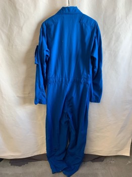 Unisex, Sci-Fi/Fantasy Jumpsuit, GIBSON + BARNES, Blue, Poly/Cotton, Solid, 44T, C.A., Zip Front, 2 Chest Pockets, 5 Cargo Pockets, Velcro At Waist, 1 Pocket At Left Arm, Zippers At Legs, "NASA" Patch On Right, "MILES HENKLE" And "MACH 25" Patch On Left Chest, USA Patch On Left Arm, Space Shuttle Patch with 1981-2001 On Right Arm