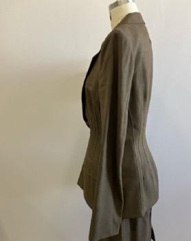 JEAN PAUL GAULTIER, Brown Linen SB. Novelty Closure, Wide Notched Lapel, Pick Stitch Detail, 2 Flap Pckt, Hour Glass Shape with Many Darts Front And Back, Stiffenners And Padding At Hip And Bum, Fully Lined
