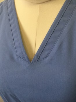 GREY'S ANATOMY, French Blue, Polyester, Rayon, Solid, Feminine Cut, Short Sleeves, V-neck, Curved Front Seams, 3 Pockets at Hips, 2 Flat Felled Seams at Waist Level