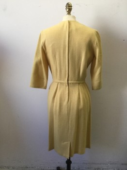 NL  , Butter Yellow, Wool, Solid, Crew Neck Fitted Dress, 3/4 Sleeves, Faux Jacket Over Dress Look Created with 1/2" Piping at Bodice with 3 Large Covered Buttons. Pencil Skirt with Pleated Front with Darts at Back,zipper Center Back, and Pleat at Back Hemline