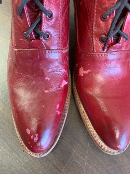 NL, Maroon Red, Leather, Solid, Lace Up Ankle Book. Narrow Toe, with Brown Contrast Stack "granny' Heel, White Top stitching Throughout , 3/4 Inch Matching Edge Detail, Painted Over Finnish