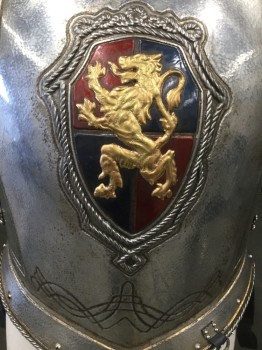 Mens, Historical Fict. Breastplate , MTO, Silver, Navy Blue, Rubber, Leather, 40, SUIT of ARMOR: Breastplate/Cuirass: Silver Rubber Aged to Look Like Metal, Molded Frame,  Leather Trim with Silver Triangle Metal Detail,  Gold Embossed Detail, Faux Rivets, Gold Lion Crest Front,Front and Back Plates, Leather Buckle Straps at Shoulder and Sides, Velcro Side Closures, Goes with CF036930, Multiple See FC0416700