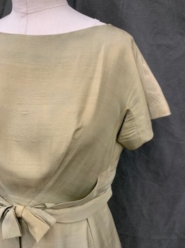 N/L, Lt Green, Silk, Solid, Boat Neck, Short Sleeves, Angled Darts Front Top, Pleated Skirt, Self Attached Pleated Belt with Bow Front, Zip Back, *Shoulder Tear That Was Repaired with Backing*