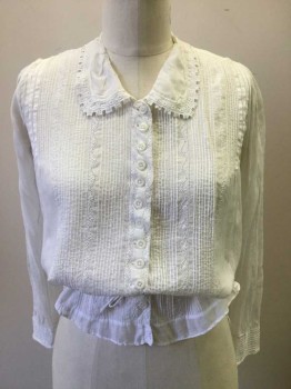 N/L, White, Cotton, Solid, Floral, Button Front Closure, Tiny Tuck Pleats at Front. Floral Eyelit Embroider Detail. Long Sleeves with Tuck Pleats at Cuffs. Lace Trim Collar. Twill Tape at Center Back, Tiny Vertical Tuck Pleats at Center of Sleeves. Repaired Holes at Collar. Repaired Hole at Right Elbow. Repaired Holes at Back in Multiple Places,