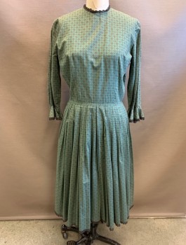 N/L, Moss Green, Brown, Black, Blue, Cotton, Geometric, 3/4 Sleeves with Self Ruffles, Dark Brown Lace Trim at Round Neck, Cuffs and Hem, Pleated Skirt, Knee Length, Button Closures Down Center Back,