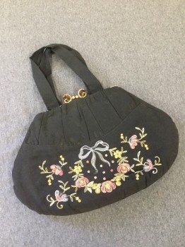 INNER GRIP JUNIOR, Black, Silk, Metallic/Metal, Floral, Black Silk Faille with Pastel Pink, Yellow, Blue & Green Floral Embroidery on One Side. Oval Shaped Purse with Self Straps. Copper Colored Clasp. Multi Colored Stripe Silk Lining,