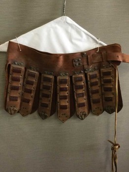 Mens, Historical Fiction Skirt, NO LABEL, Brown, Dk Brown, Leather, Metallic/Metal, Belt Buckle At Waist, Hanging Straps W/ Dk Brown Textured Leather Woven Through, Studded with Metal Pieces At End Of Tabs, 1 Leather Lace Hanging From Belt Loop