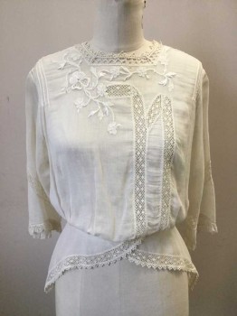 N/L, Off White, Cotton, Solid, Square Neckline, 3/4 Sleeves. Inlay Lace Panelling Detail at Front Left, Sleeves, Waist and Asymmetrical Peplum Hemline. Square Neckline with Floral Embroidery at Neck Front, Button Closure Center Back, (2 Buttons Missing). Neckline in Fragile State. Polyester Lace Repair at Shoulders. Small Hole at Center Front Neckline. Small Stain at Left Sleeve,