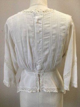 N/L, Off White, Cotton, Solid, Square Neckline, 3/4 Sleeves. Inlay Lace Panelling Detail at Front Left, Sleeves, Waist and Asymmetrical Peplum Hemline. Square Neckline with Floral Embroidery at Neck Front, Button Closure Center Back, (2 Buttons Missing). Neckline in Fragile State. Polyester Lace Repair at Shoulders. Small Hole at Center Front Neckline. Small Stain at Left Sleeve,