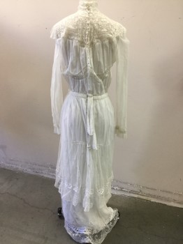 MTO, Off White, Cotton, Silk, Novelty Pattern, Beautiful Off White Lace Bodice with Batiste, High Neck, Sheer Mesh Sleeves and Skirt Overlay, Two Lace Ruffled Tiers, Tiny Covered Button Up Back with Loops, Snaps, One Inch Waist Band with Self Vine Leaf Embroidery,