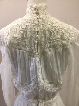 MTO, Off White, Cotton, Silk, Novelty Pattern, Beautiful Off White Lace Bodice with Batiste, High Neck, Sheer Mesh Sleeves and Skirt Overlay, Two Lace Ruffled Tiers, Tiny Covered Button Up Back with Loops, Snaps, One Inch Waist Band with Self Vine Leaf Embroidery,