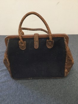 Black, Tan Brown, Wool, Leather, Solid, Small Day Purse. Black Wool Sides with Tan Crocodile Leather Sides, Opening and Handles, Buckle Strap Closure. Leather is Very Dry See Photo Close Up,