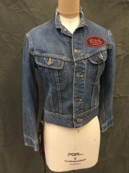LEE/MTO, Blue, Black, Red, White, Cotton, Leather, Solid, Blue Jean Jacket, Button Front, Stand Collar with Black Leather Attached, Yoke, 2 Flap Pockets, Collar Cut Off, Black Leather, Red/White/Blue with Silver Star Back Patch, Red/Black Fringe Dangle From Right Side, "Bitch" Name Tag Patch