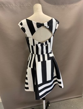 KATE SPADE, Black, White, Polyester, Geometric, Cap Sleeve, Princess Darts, Cut Out Back Detail with Bow Accents at CB. Side Seam Zipper, Pockets at Side Seam.