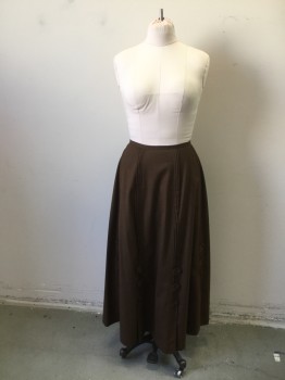 N/L MTO, Chocolate Brown, Wool, Solid, Long Skirt with Panels and Novelty Tabs with Covered Buttons. Tuck Pleat Detail at Seam Lines. Inverted Pleat at Center Back, Made To Order
