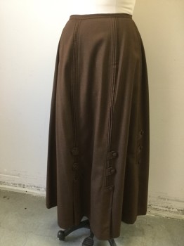 N/L MTO, Chocolate Brown, Wool, Solid, Long Skirt with Panels and Novelty Tabs with Covered Buttons. Tuck Pleat Detail at Seam Lines. Inverted Pleat at Center Back, Made To Order