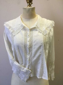 NL, White, Cotton, Solid, Floral, Button Front, Long Sleeves, Sailor Collar. Lace Trim on Collar Cuffs and inlayed on Sleeves and Front Panels. Tuck Pleats at Back. Tape at Center Back Cut Off. Hole on Left Collar at Shoulder. Holes at Right Elbow,