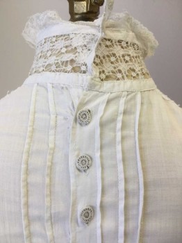 N/L, White, Cotton, Solid, Novelty Fagotting Detail at Front with Tuck Pleats at Either Side. Long Sleeves with Tuck Pleats at Cuffs. Fagotted Collar Band with Lace Trim. Center Back Button Closure. Delicate Covered Buttons. Self Tie at Back Waist. Lower Half of Back with Snap Closure Under Faux Buttons. Holes at Fagotting Detail at Left Front Neck . Holes at Back Neck Collar Band. Holes at Center Back Waist Lower,
