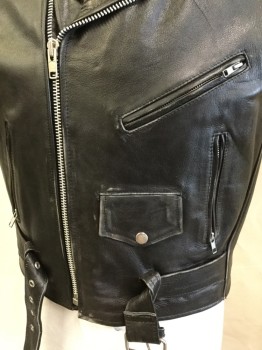 Mens, Leather Vest, XELEMENT , Black, Leather, Polyester, Solid, 46, (4 of Them:  44, 46, 48-50, 52) (aged/distressed) Black Leather, Black Quilt Lining, Motorcycle Style, Collar Attached with Silver Snap, Epaulettes, Off Side Zip Front, 4 Pockets, Belt Front Bottom with Metal Buckle, Orange/yellow/green Dog Face Design with " the VICIOUS CYCLES, NEW YORK" in the Back