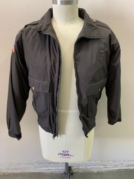 Mens, Fire/Police Jacket, FLYING CROSS, Dk Brown, Nylon, Polyester, Solid, L, Dark Brown with Light Khaki and Pea Green "Sheriff" Patch on Left Arm, USA Flag Patch on Right Arm, Zip Front, 4 Pockets with Gold Buttons on 2, Gold Button on Epaulettes, Elastic Cuffs and Waistband, Removable Liner with Barcode Written on Right Armscye