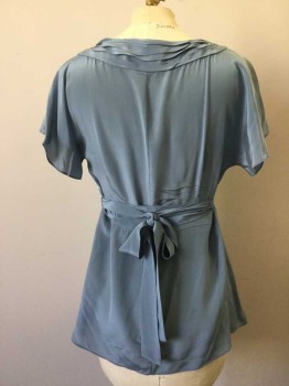 BANANA REPUBLIC, Slate Blue, Silk, Solid, V. Neck with Pleated Detail, Short Sleeve, and Matching Self Belt. Invisible Zipper at Left Side. Some Sun Damage to Left Shoulder