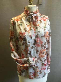 TEDDI, Putty/Khaki Gray, Polyester, Floral, Putty Background with Rust and Red Browns in Floral Print, Poly Knit, Button Front, Long Sleeves, Collar Band & Cuffs Trimmed with Self Ruffle. Self Tie at Neck. No Buttons at Cuffs, Late 70's Early 80's Blouse.