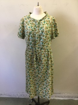 N/L, Beige, Forest Green, Aqua Blue, Turquoise Blue, Cotton, Floral, Floral Printed Cotton. Jewel Neck with Self Tie at Neck, Short Sleeves, Skirt Pleated to Waist. No Zipper in Dress. No Belt
