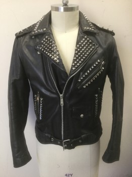 Mens, Leather Jacket, U MR, Black, Silver, Leather, Metallic/Metal, Solid, 44, Motorcycle Jacket, Zip Front, Silver Metal Pyramid Studs Throughout, 3 Zip Pockets, Epaulettes at Shoulders with Pointy Silver Studs, Self Belt Straps Attached at Side Waist with Silver Buckle, **Light Wear Throughout