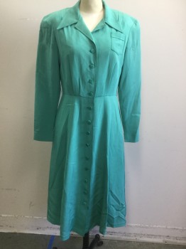 N/L MTO, Jade Green, Silk, Solid, Broadcloth, Long Sleeves, Shirtwaist, Pointy Collar Attached, Tiny Patch Pocket at Bust, Padded Shoulders, Button Front, Pleats at Center Front Waist/Bust, Flared/Full Skirt, Knee Length, 2 Pockets at Hips in the Seam, Made To Order, Bodice Flat-lined in Muslin. Multiples,