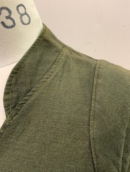 N/L, Dk Olive Grn, Cotton, Solid, Unusual Wrapped Front with Brass Snap Closure, V-neck, Stand Collar, 1 Slanted Patch Pocket at Front, Padded Arm Openings at Shoulders, Asymmetric Front Hem, Mustard Lining