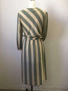 N/L, Cream, Forest Green, Wool, Stripes - Diagonal , Jersey, Long Sleeves, Round Neck, Elastic Waist. Button Closure at Left Shoulder, Knee Length, ***Matching Self Belt