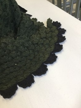 NL, Dk Olive Grn, Black, Wool, Silk, Solid, Wool Head Wrap for Cold Weather. Crochet Knit in Olive Green with Pom Poms at Forehead. Black Crochet Trim at Right Side Tie. Black Grosgrain Ribbon Bow at Center Back Neck,