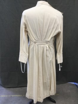 Unisex, Historical, MTO, Cream, Cotton, Herringbone, Ch: 48, Doctor's Gown/Jacket, Crossover Front, Mother of Pearl Shoulder Buttons and Side Buttons, Stand Collar, Long Sleeves, Embroidered Medical Caduceus on Pocket, Floor Length, Pleated at Back Waistband with Mother of Pearl Buttons, Side Vent Slits **Sleeves Shortened/Cuffs Removed