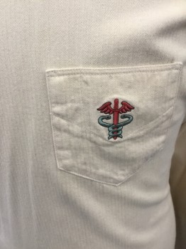 Unisex, Historical, MTO, Cream, Cotton, Herringbone, Ch: 48, Doctor's Gown/Jacket, Crossover Front, Mother of Pearl Shoulder Buttons and Side Buttons, Stand Collar, Long Sleeves, Embroidered Medical Caduceus on Pocket, Floor Length, Pleated at Back Waistband with Mother of Pearl Buttons, Side Vent Slits **Sleeves Shortened/Cuffs Removed
