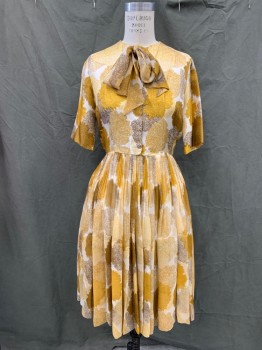 ADLER, Goldenrod Yellow, Cream, Brown, Silk, Floral, Pom-pom Looking Floral Pattern, Button Front Top, Chiffon Tie Neck Embedded in Neck, Short Sleeves, Knife Pleated Chiffon Skirt Over White Silk,