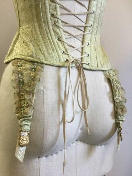 MTO, Lime Green, Taupe, Silk, Cotton, Floral, Steel Busk Front. Steel Bones, Lacing Center Back, Floral Brocade.4 Garter Straps with Taupe Organza Ruffle Trim & Green & Yellow Floral Embroidered Trim. Gold Painted Filigree on Garter Straps