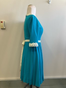 MTO, Turquoise Crepe, Round Neck,  3/4 Slvs, Pleated Skirt, Heavy White Lace Daisy Trim At Neck/Cuffs And Matching BELT, Belt Loops, Back Zip,
