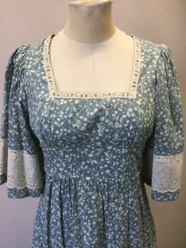 N/L, Slate Blue, Ecru, Rayon, Cotton, Floral, Slate Blue with Ecru Floral Calico Pattern, Ecru Cotton Eyelet Trim with Scallopped Edge at 3/4 Sleeves and Hem, Square Neck with Eyelet Trim, Empire Waist, Self Ties at Waist, Floor Length Gunne Sax-Style Prairie Dress,